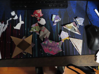 Joseph Freeman origami collection — paper-folded frogs, cranes, dragons, and more